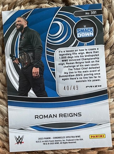 ROMAN REIGNS 2023 PANINI-CHRONICLES SPECTRUM PURPLE PRIZM PARALLEL SN/49 #391 - Picture 2 of 2