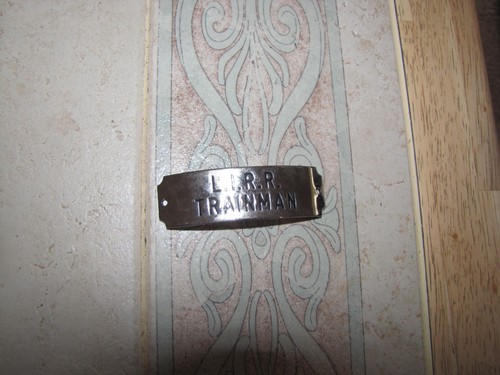 Vintage TRAINMAN Silvery LONG ISLAND NY Railroad HAT BADGE