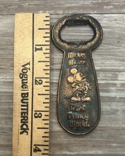 MICKEY MOUSE WALT DISNEY WORLD CENTURY BOTTLE OPENER souvenir metal embossed