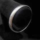 Monet Silver Tone Bangle Bracelet with Star Designs Vintage Costume Jewelry