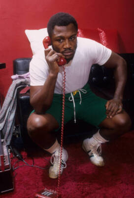 Joe Frazier on phone before sparring session during training - 1974 Old Photo