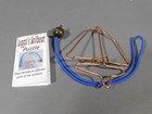 Juggo's Sailboat Puzzle & instruction booklet. Copper Wire Maze w/Loop & Bead — photo 3