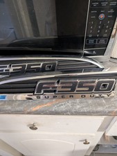 2012 Ford F350 Diesel Lh. Rh Side Fender Emblem Bc34-25000a73-b Oem 204