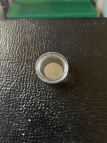 Raw 1874 Colombia 1 1/4 Centavos