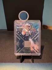 2023 Spectra Brilliance Amon-Ra St Brown Neon Blue #BRI-ASB Detroit Lions /50