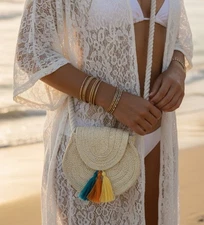 Cream straw crossbody bag with multi-coloured tassels