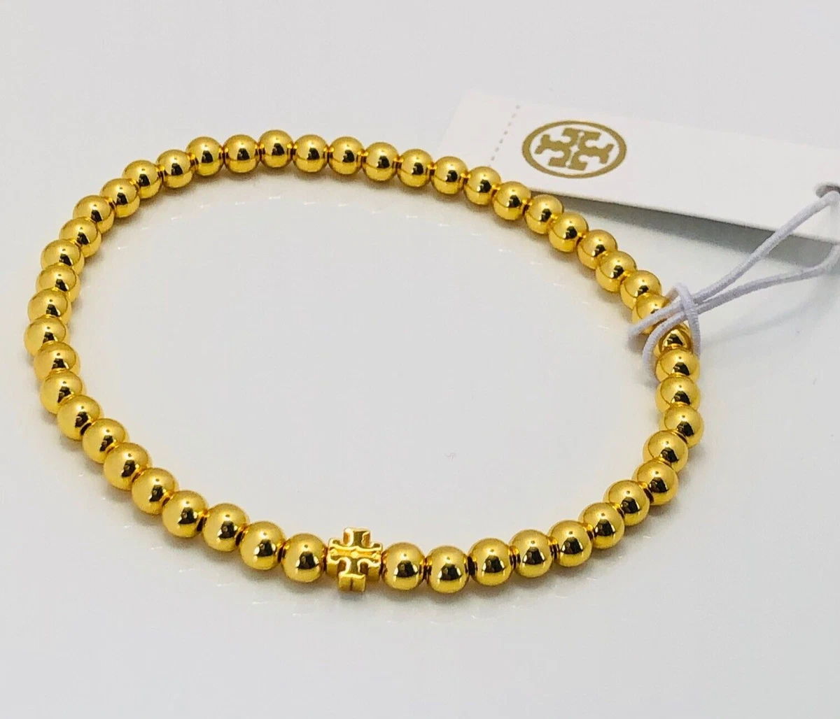 Tory burch gold bead bracelet deals