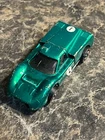 Hot Wheels Redline 1967 Ford J-Car Green (US) with Dark Interior and Badge