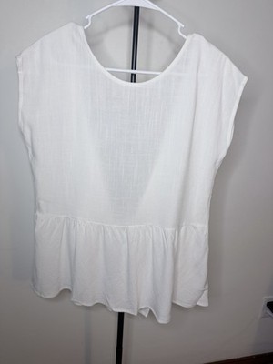 White blouse with bows at the back, size S.