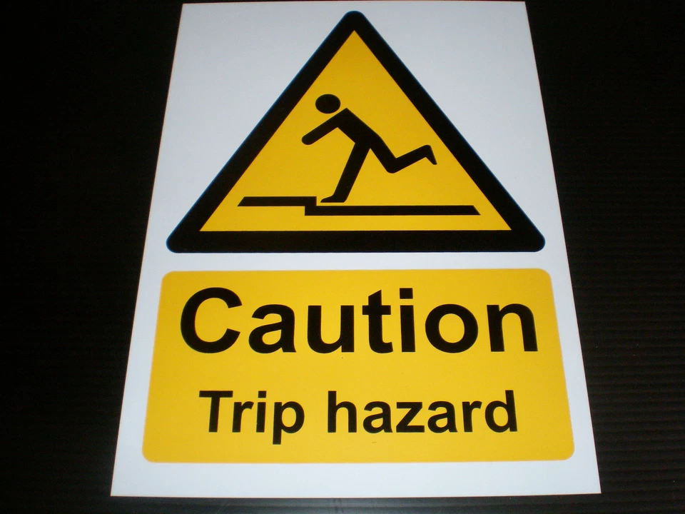 CAUTION TRIP HAZARD sign or sticker stairs step loose floor ramp congestion slip