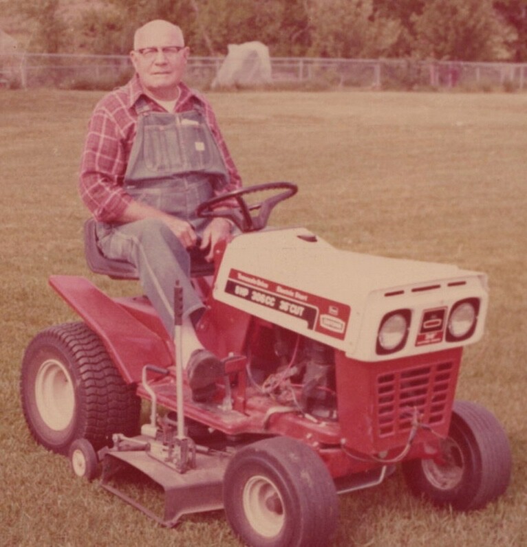 Cute Old Man Riding Lawn Mower Outdoor Yard Scene 1980s Farmer