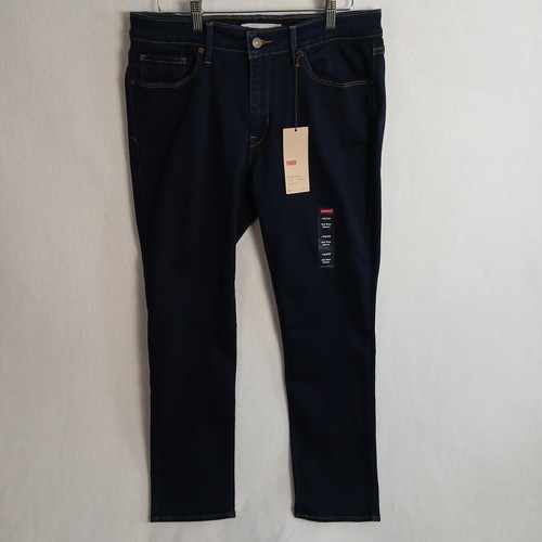 Pantalones de mezclilla ajustados de tiro medio para mujer Levi’s talla 14S/32 lavado oscuro elásticos nuevos con etiquetas - Imagen 10 de 19
