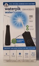 New SEALED Waterpik Brand Cordless Water Flosser Waterproof Rechargeable 4 Tips