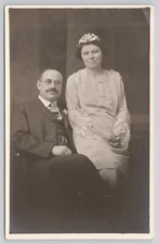 Real Photo Postcard Couple In Portrait Studio Lace Sleeves Pearls RPPC