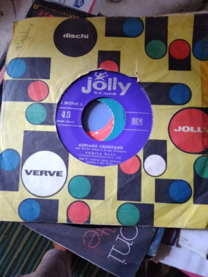 7'' ADRIANO CELENTANO 24MILA BACI AULI' ULE VINILE EX+ COVER FORATA JOLLY