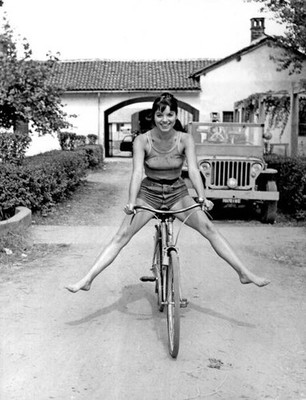 The Italian actress Elsa Martinelli riding a bicycle during shooti- Old Photo 3