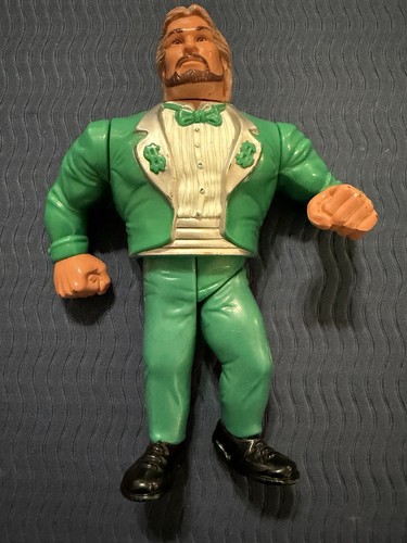 WWF WWE Hasbro Green Million Dollar Man...
