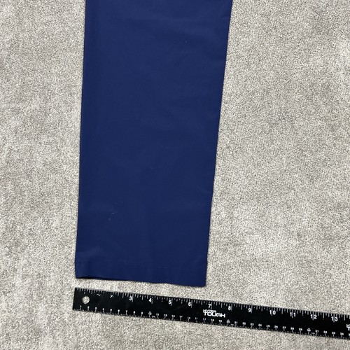 Pantalones de cercanías Rhone para hombre chinos azul marino 34 33" entrepierna exterior senderismo golf poliéster - Imagen 13 de 14