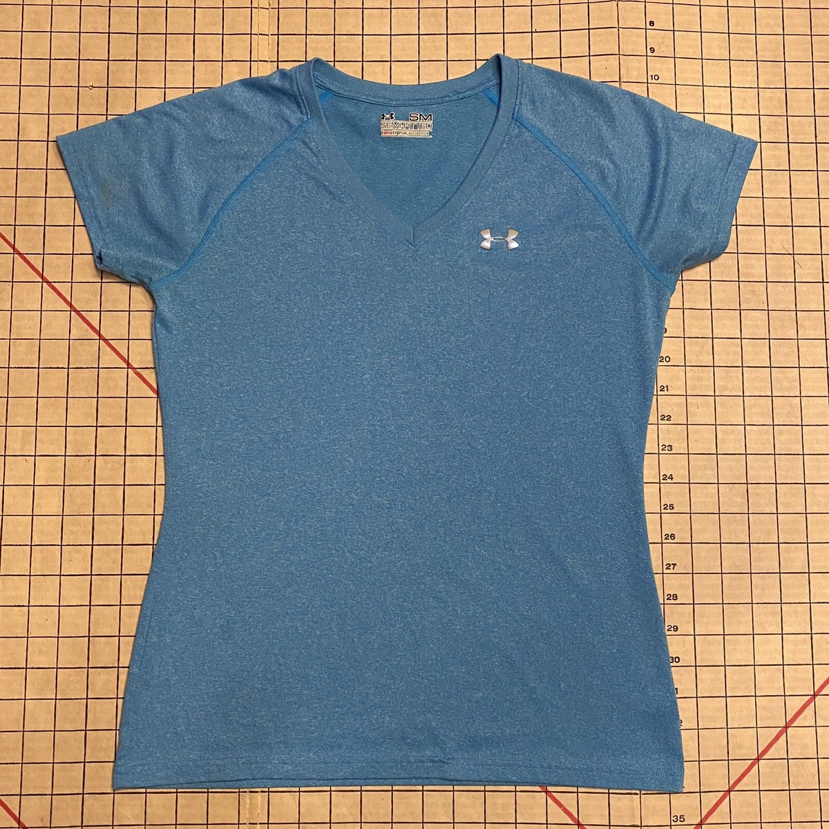 Under Armour Heat Gear top size small, aquamarine blue