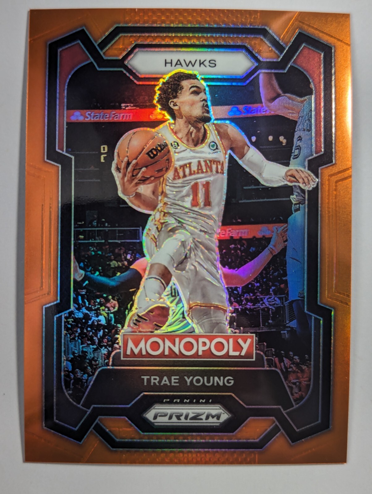 2023-24 Panini Prizm Monopoly #4 Trae Young Orange Prizm #D 57/124