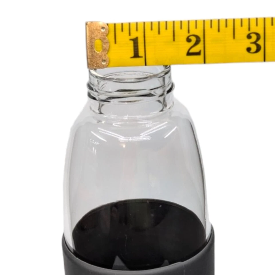 Botella de agua de vidrio Veegoal 18 OZ a prueba de fugas con 2 tapas, funda de silicona Foto 4 de 4