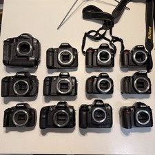 Lot of 12 Canon, Nikon DSLR Cameras - AS/IS