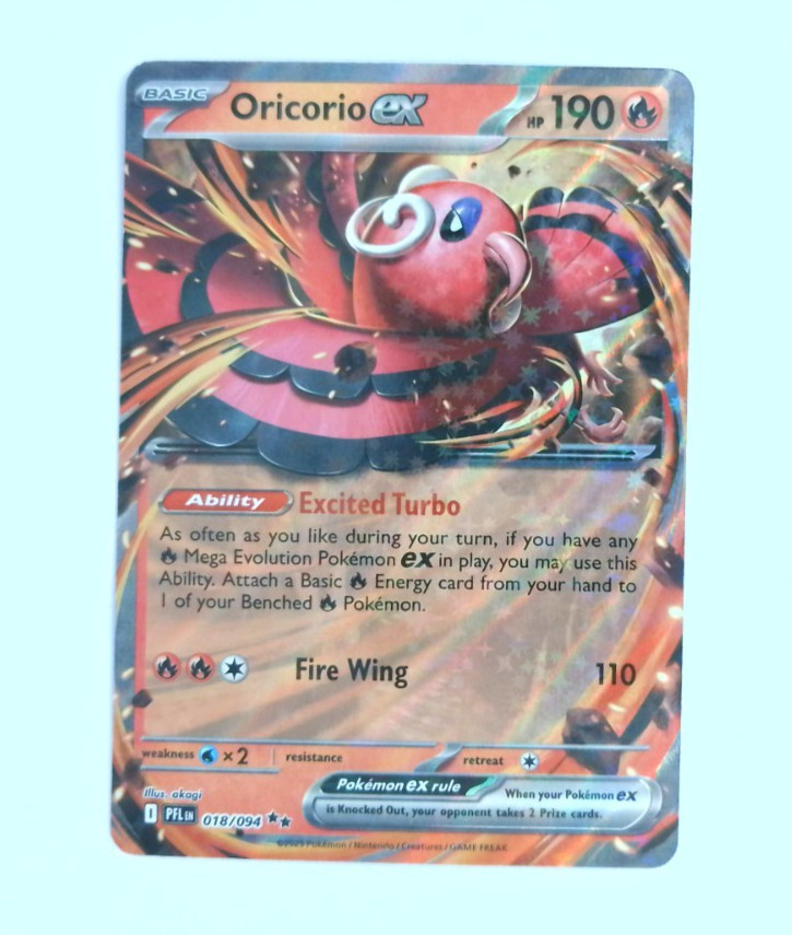 Oricorio ex 018/094 Me02: Phantasmal Flames Holo Lightly Played