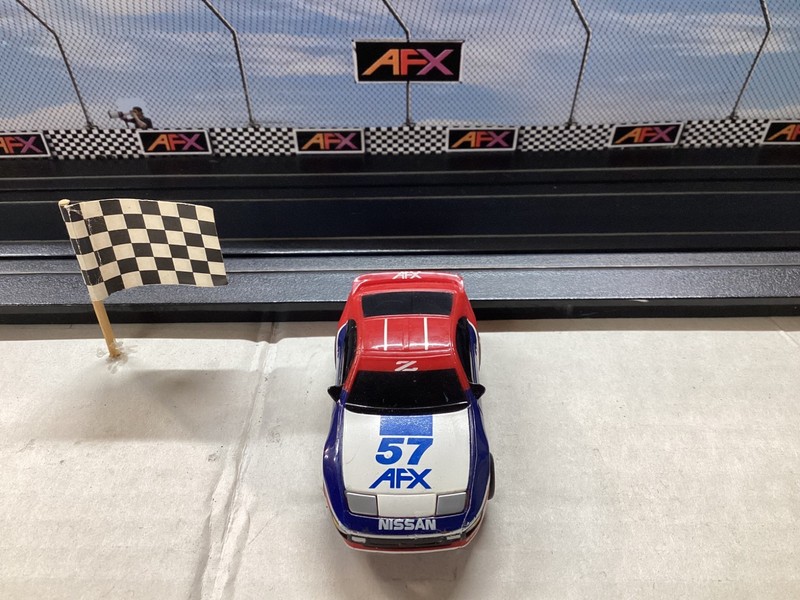 AFX  AURORA TOMY #57 NISSAN SPONSORED 300ZX ROAD RACER SUPER G+ CHASSIS SLOT CAR