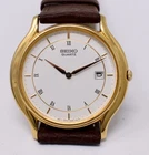 Vintage Mens Seiko Quartz Thin Dress Wristwatch w/ Date Gold Plated 7n29-8a09