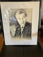 protrait of robert de niro with cigar in hand