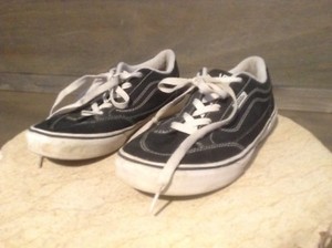 beat up black vans