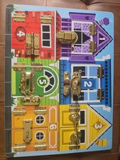 Melissa  Doug Educational Locks and Latches Board.