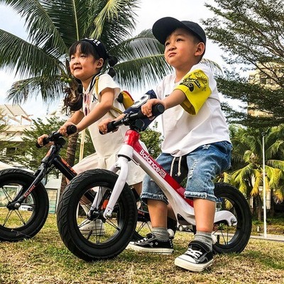 children driving bike