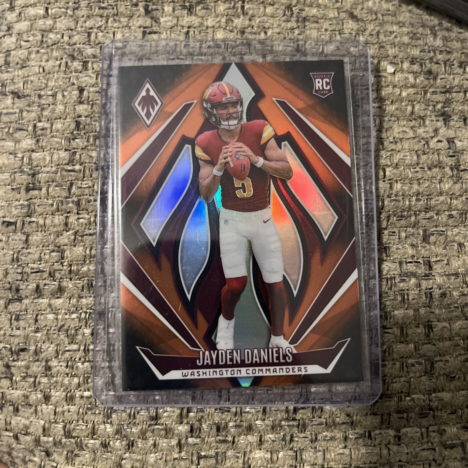 2024 Panini Phoenix - Rookies Jayden Daniels #198 Orange Fade (RC)