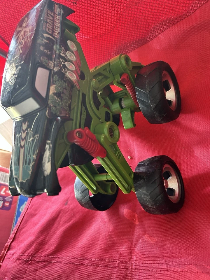 Camión de juguete Hot Wheels Monster Jam 2004 excavadora de tumbas 30 aniversario mega puente aéreo Foto 2 de 4