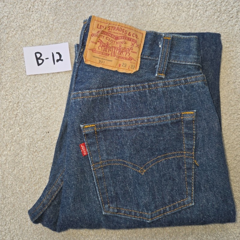 1983 Vintage Levis 501XX 29x32 STF Button Fly Jeans measures 26x28