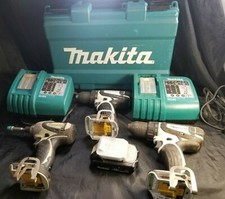 Makita Drill Driver LXFD01 and Impact Driver BTD142 w 1 18V Battery  Charger