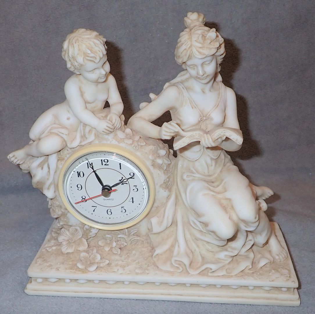 Vintage 1999 Crosa Quartz Clock Set In A Mother and Child Vintage 1999 Crosa Quartz Clock Set In A Mother and Child