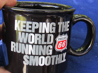 Phillips 66 Coffee Mug / keeping the world running smoothly Black