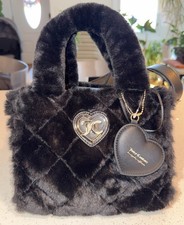 Juicy Couture "Let's Get Cozy" faux fur tote bag featuring a quilted texture.
