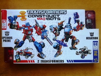 Transformers Construct-Bots Ultimate Class Optimus Prime vs Megatron
