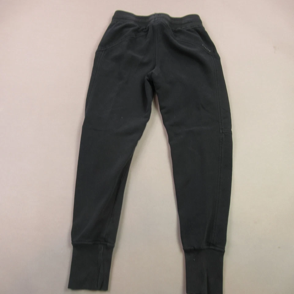 Pantalones Oakley Mujer Pequeños Ligeros Pierna Cónica Exterior Cintura Elástica Negros Foto 4 de 4