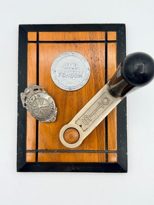 1920s Otis Fensom Elevator Set: Fire Brigade Badge, Deadman Crank, Medallion
