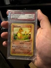 Charmander 46/102 Base Set (Shadowless) 1st edition PSA 10 (damaged box)