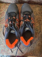 New Balance Men's Athletic Sneaker Gray/Orange/Black Lace-Up Low Top Rubber Sole