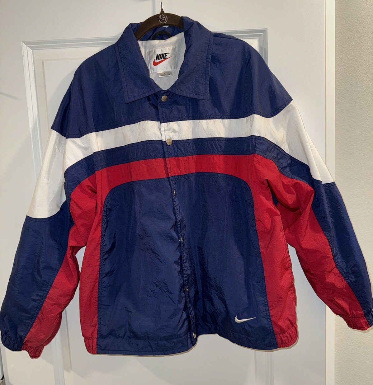 blue white and red nike windbreaker