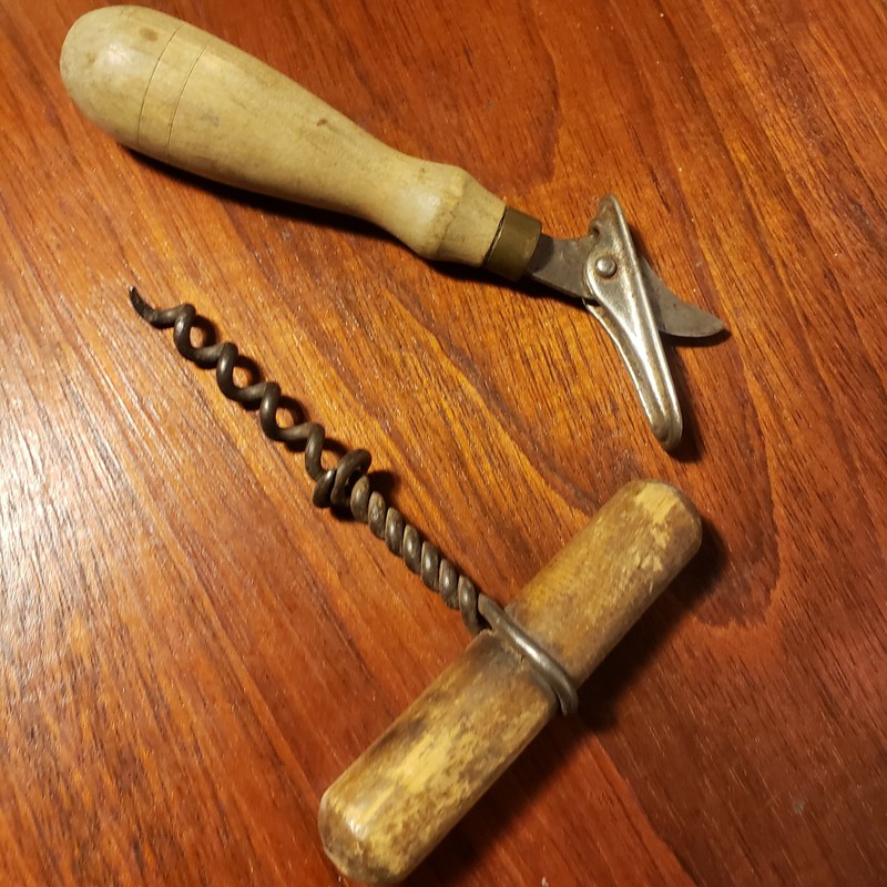 Two antique kitchen utencils, bottle and can openers