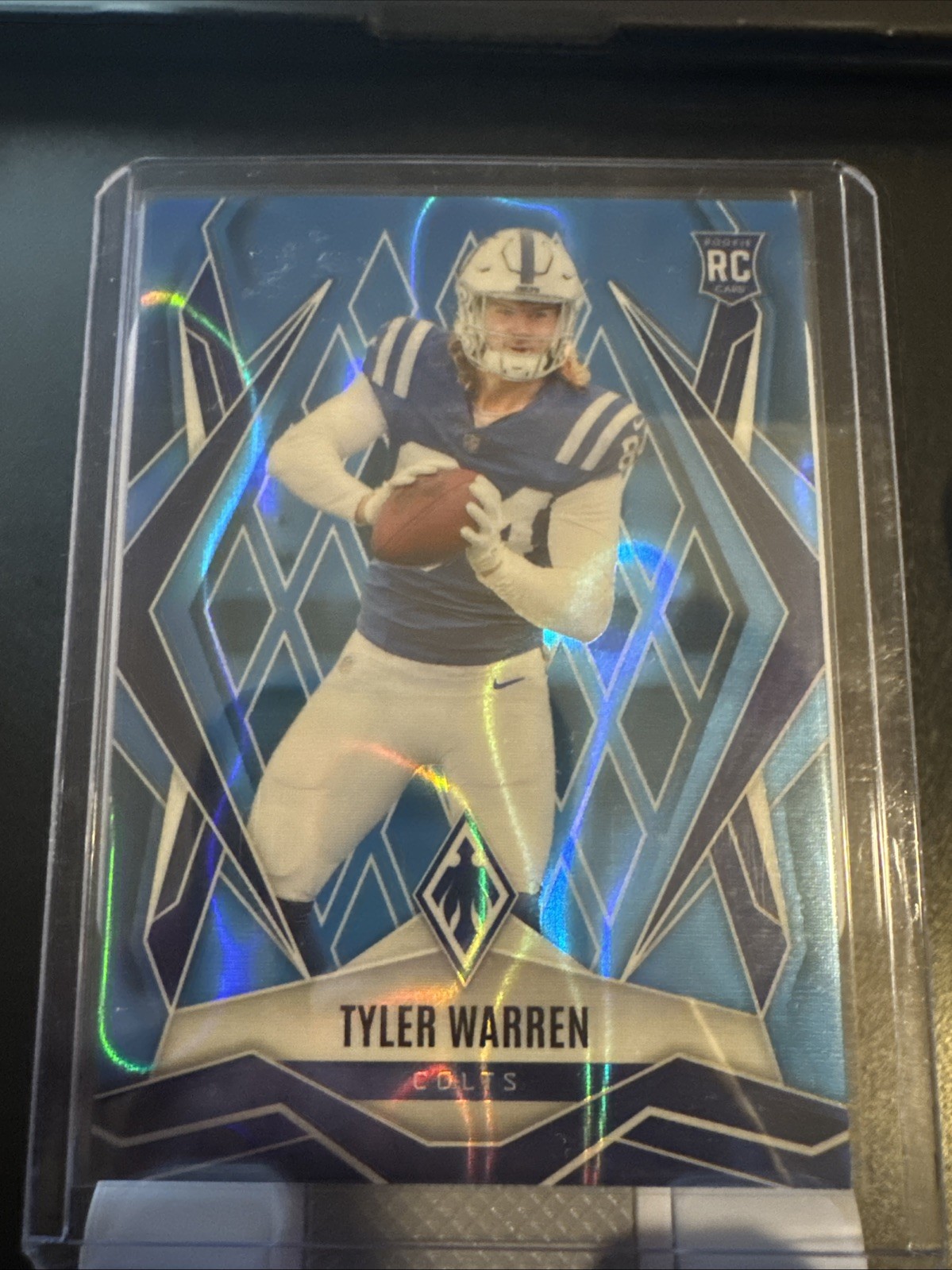 2025 Panini Phoenix - Rookies Tyler Warren #185 Light Blue Lava /325 (RC)