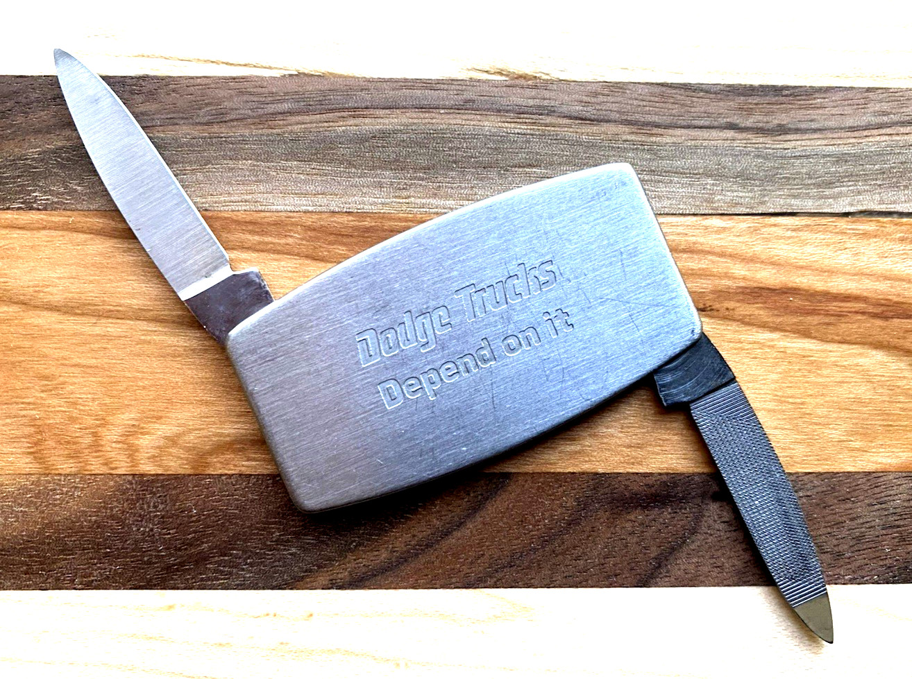 1970s DODGE TRUCKS ZIPPO POCKET KNIFE & FILE Bradford PA Depend on it stainless