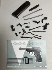 LOF OF 20 WHALTER P38/P1 PISTOL PARTS INCLUDING BOOKLET IN ENGLISH.
